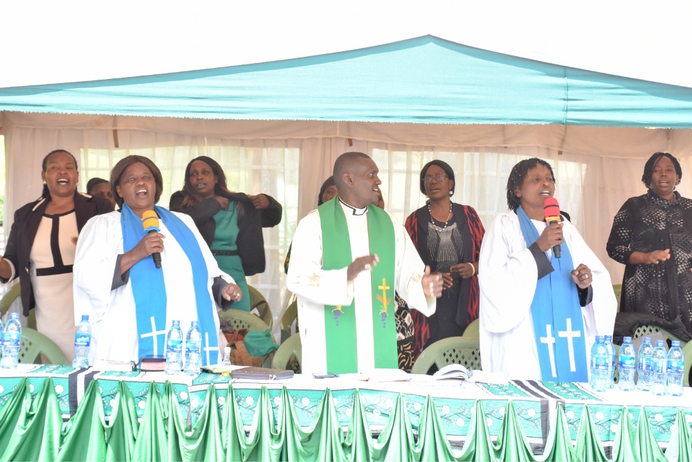 Church moment led by Venerable Archdeacon Benard at the Murayas event