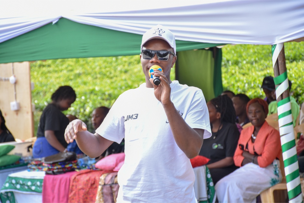 Paul on the microphone during the alumni presentation