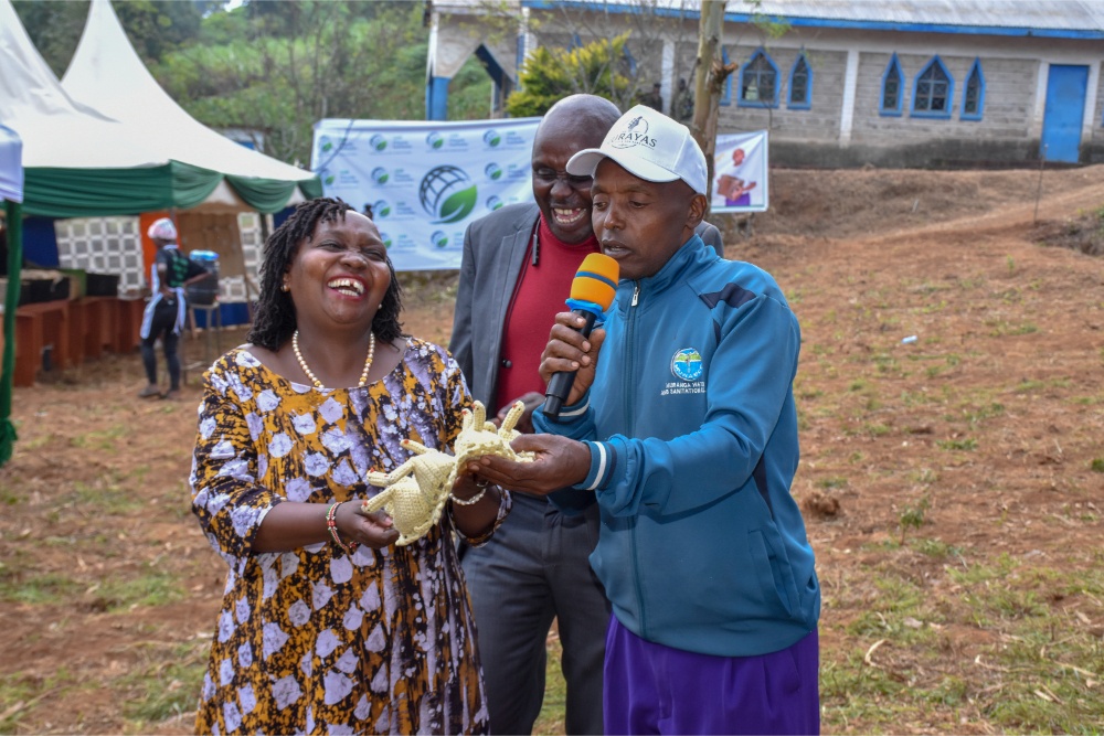 The Murayas presenting a special gift to Chairlady Hannah