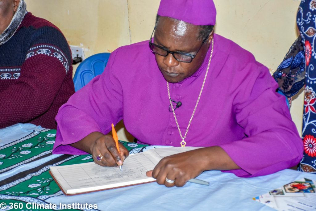 Commemorative signing during the dedication and inauguration of the 360 Climate Institutes training centre.